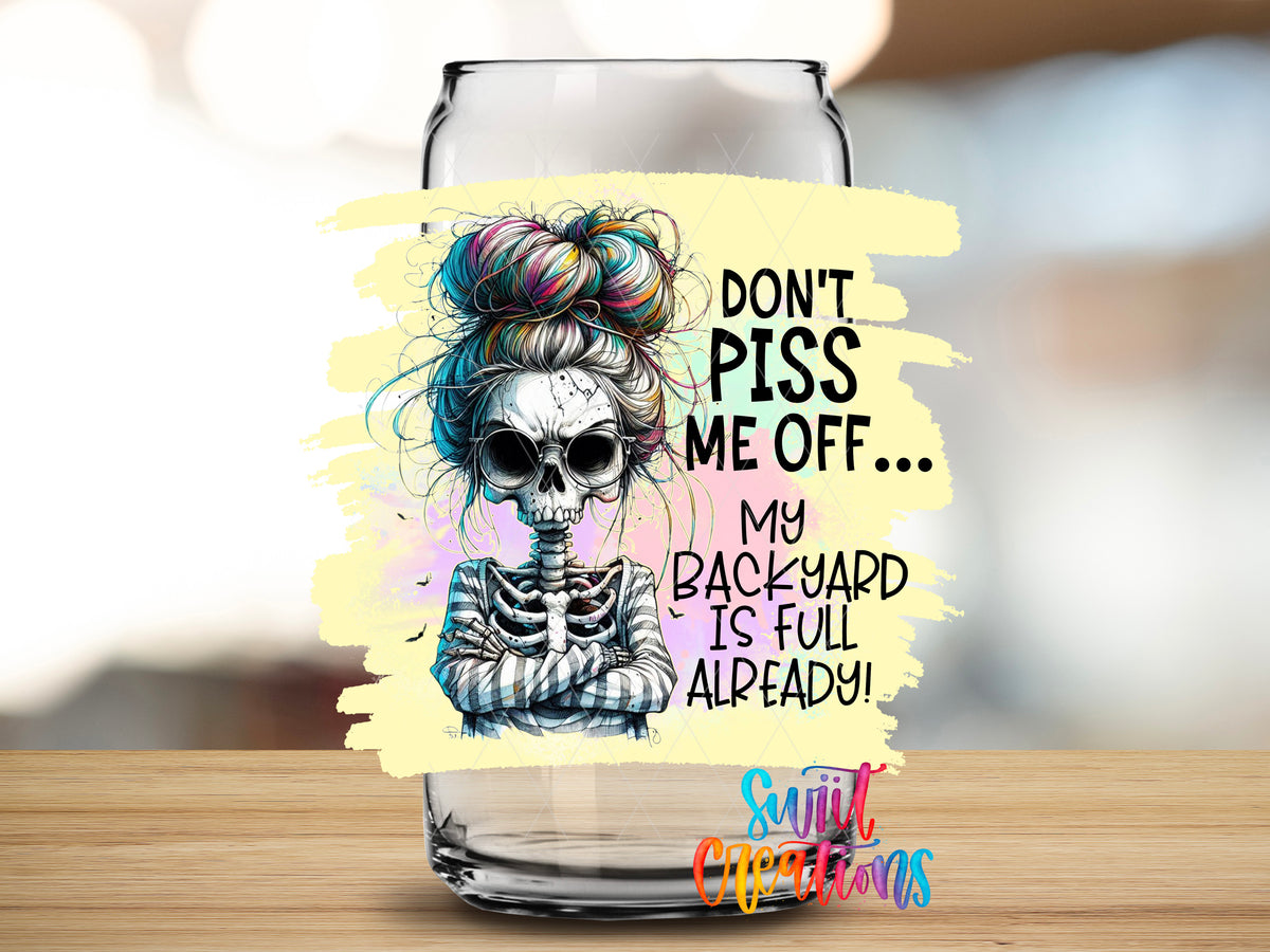 Do Not Piss Me Off Skeleton design close-up on a clear glass can tumbler