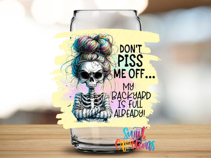 Do Not Piss Me Off Skeleton design close-up on a clear glass can tumbler