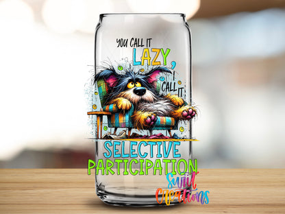 Selective Participation design close-up on a clear glass can tumbler