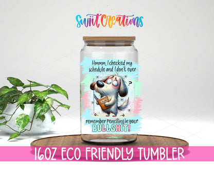 Checked My Schedule Dog design on a 16 oz clear glass tumbler with bamboo lid