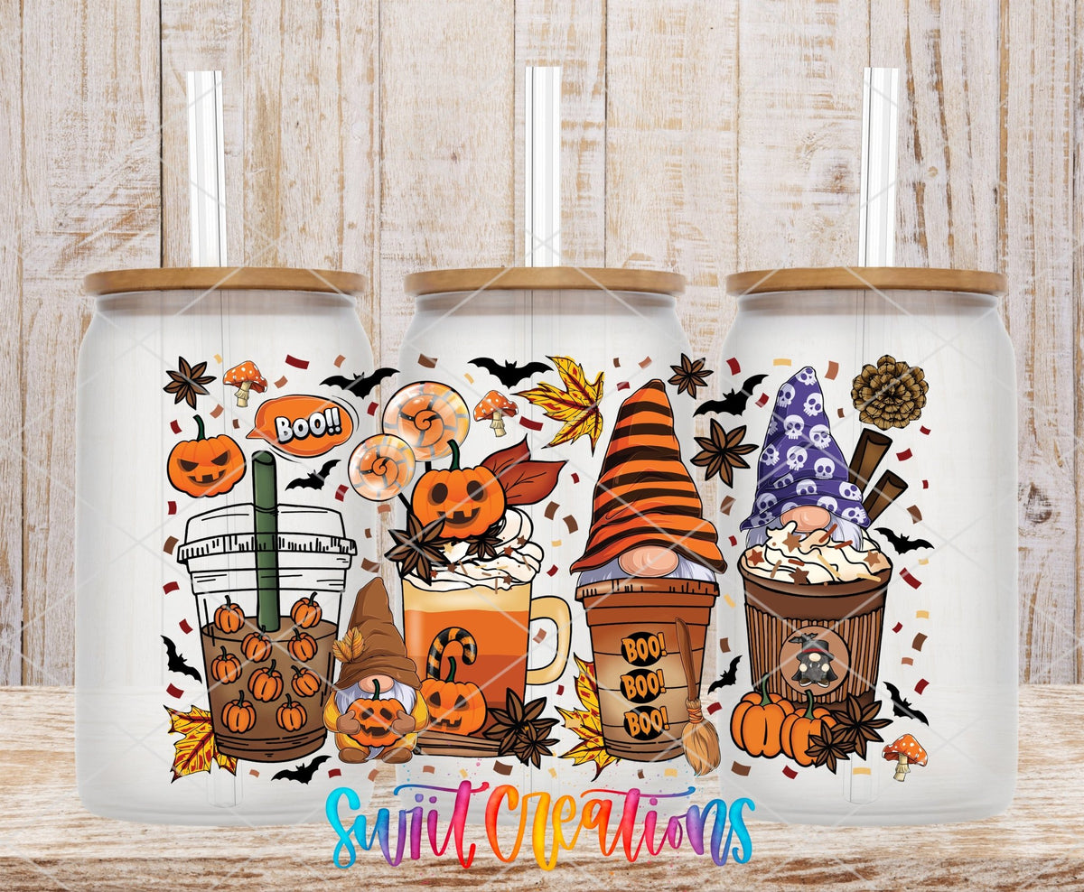 Halloween Gnome Coffee UV DTF wrap on three clear glass cans with bamboo lids
