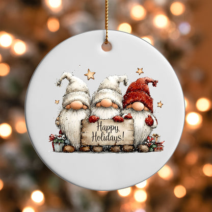 Happy Holidays Gnome Trio ornament UV DTF transfer on a round white ornament with a bokeh light background