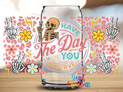 Close-up of the Have the Day You Deserve UV DTF full wrap on a clear glass can
