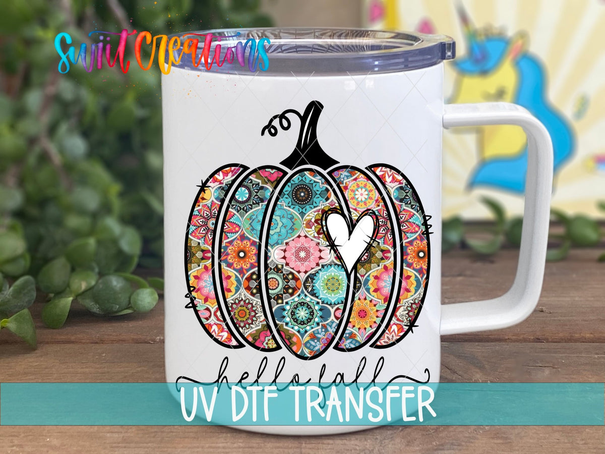 Hello Fall patchwork floral pumpkin UV DTF transfer on a white stainless steel mug with a lid