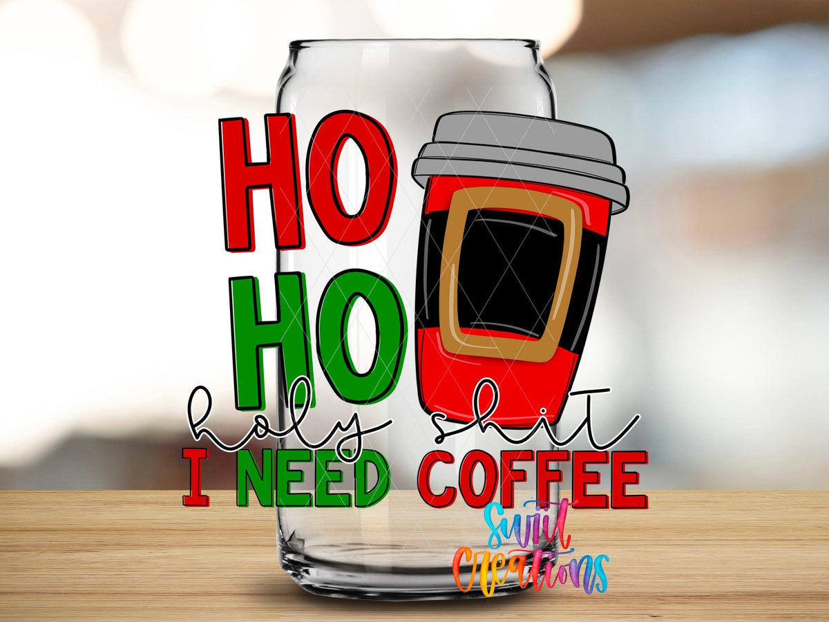 Close-up of the Ho Ho Holy Sh*t I Need Coffee UV DTF transfer on a clear glass can