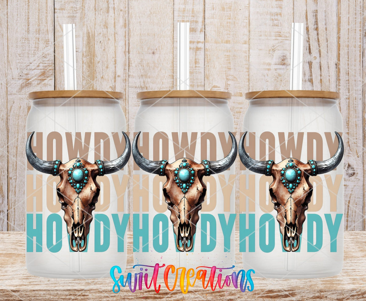 Howdy turquoise bull skulls UV DTF full wrap on three clear glass cans with bamboo lids