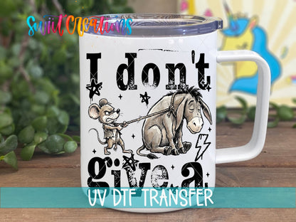 I Don't Give a Rat's A*s UV DTF transfer on a white stainless steel mug with a lid