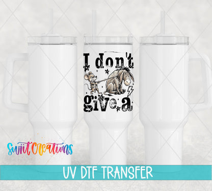 I Don't Give a Rat's A*s UV DTF transfer on white 40 oz tumblers