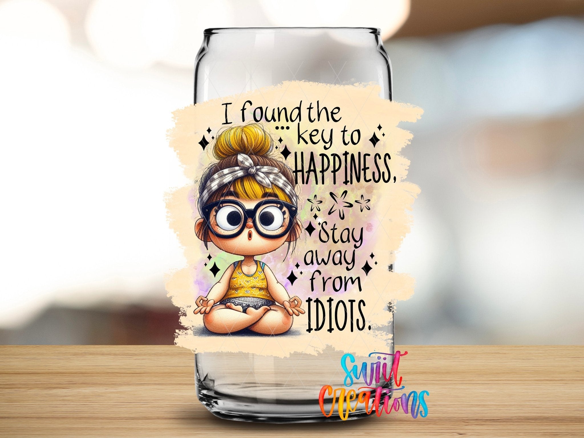 Swiit Creations UV DTF I Found the Secret to Happiness transfer applied to a clear glass can