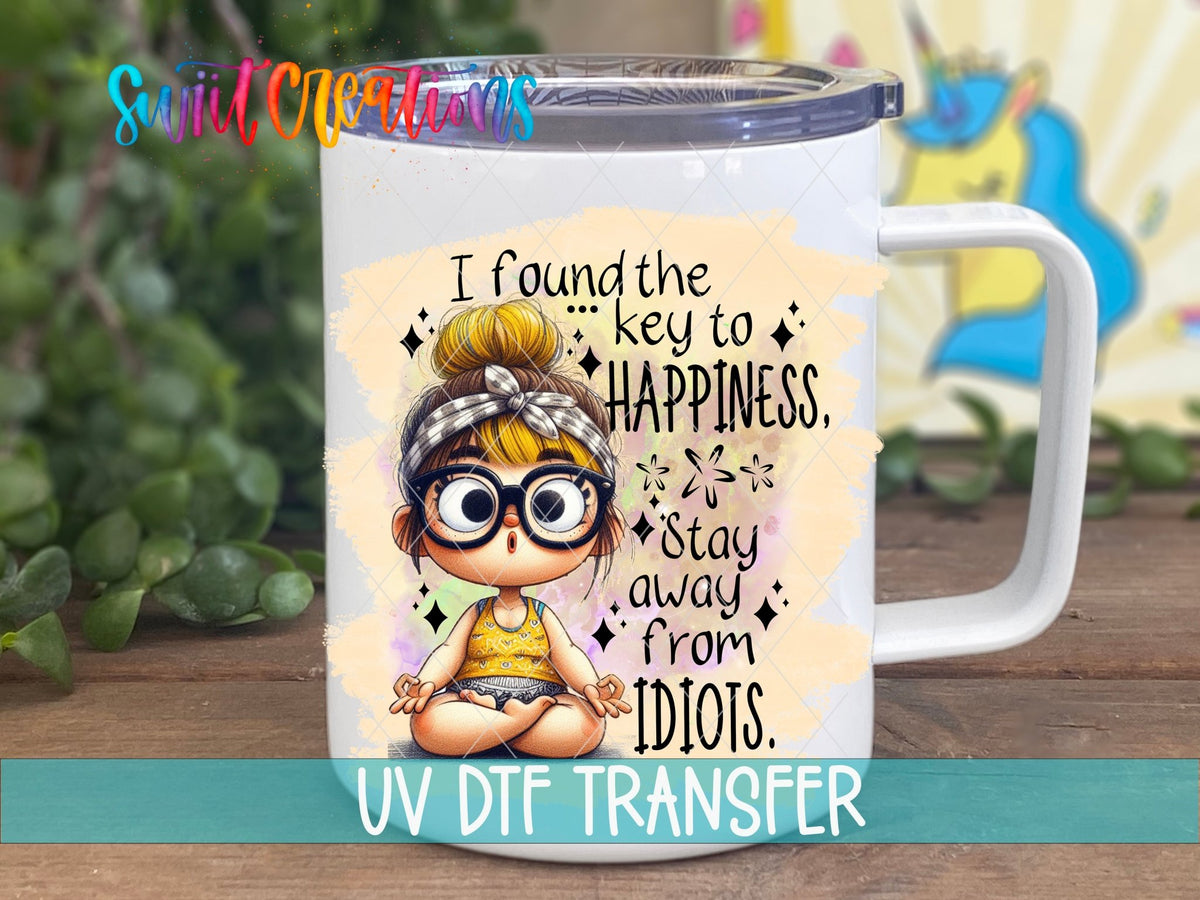 I Found the Key to Happiness UV DTF transfer on a white stainless steel mug with a lid