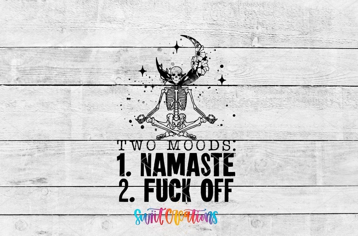 Two Moods Namaste and F*ck Off UV DTF transfer artwork on a white wood background