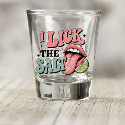 I Lick The Salt shot glass UV DTF transfer with pink lips, tongue, and lime slice details on a clear shot glass