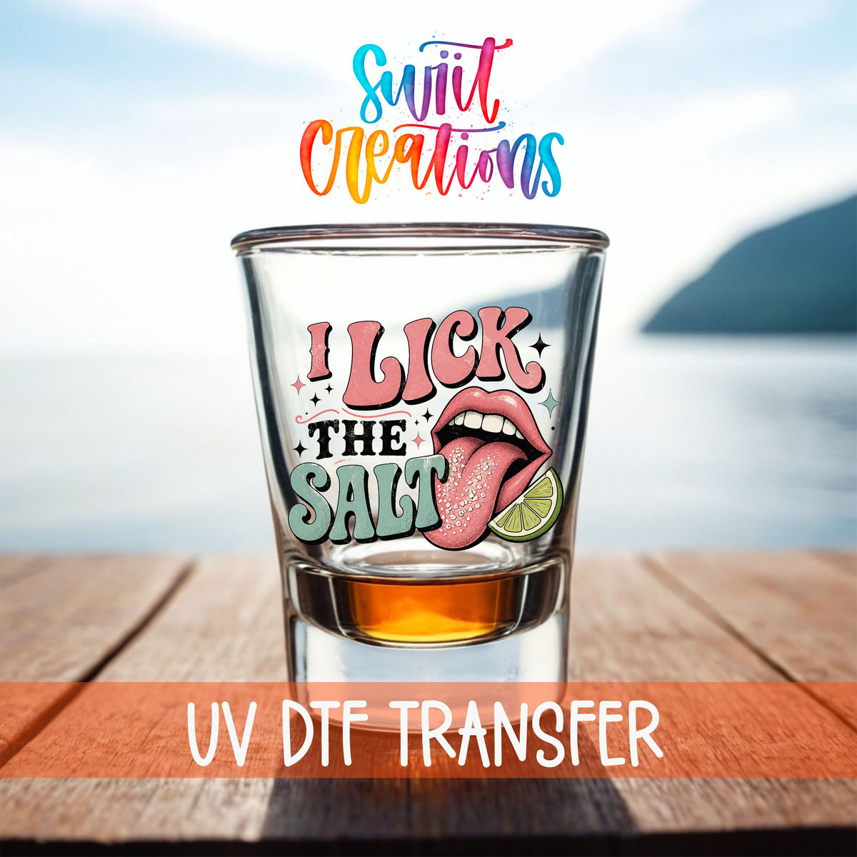 I Lick The Salt shot glass UV DTF transfer on a filled shot glass on a dock by the water