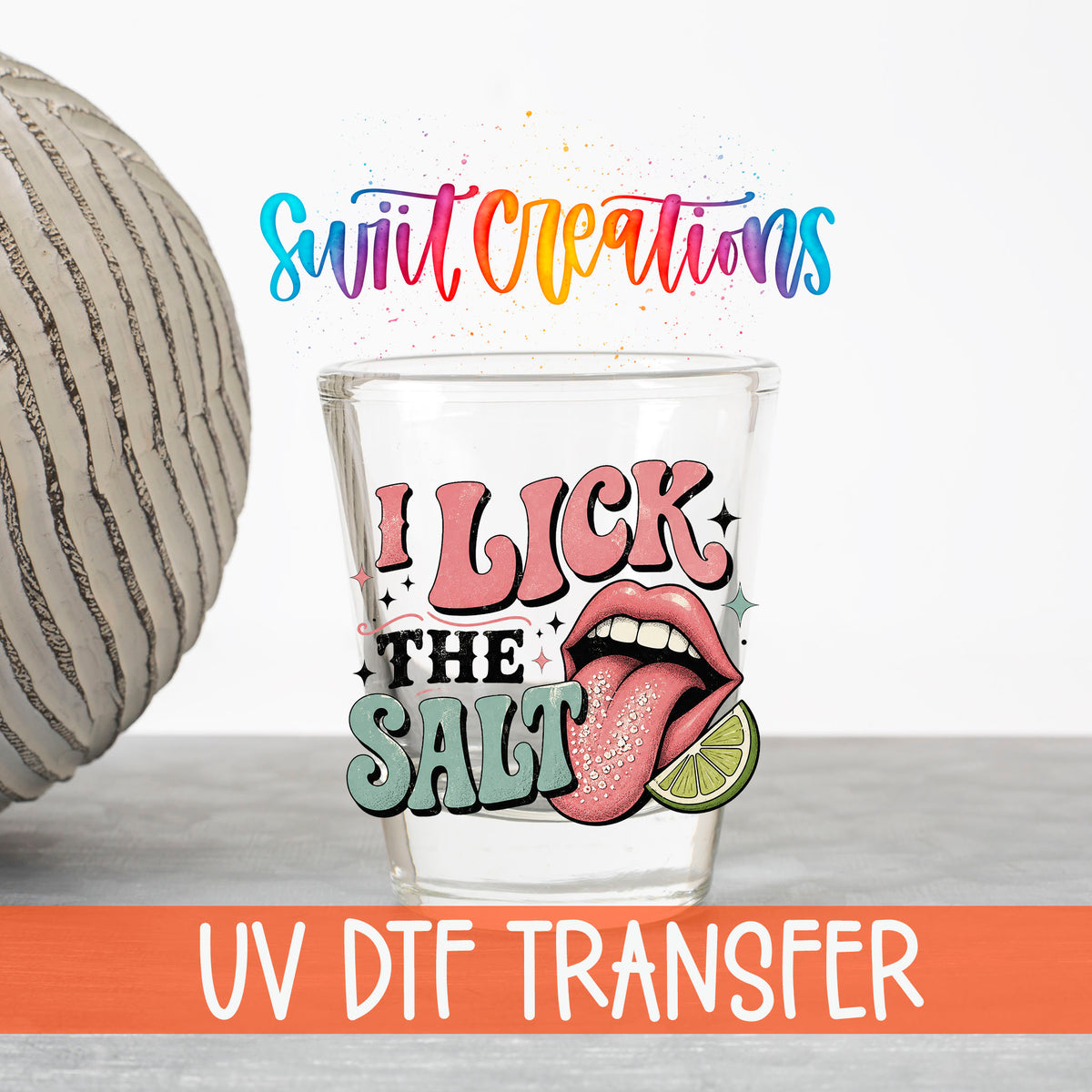 I Lick The Salt UV DTF transfer on a clear shot glass with the Swiit Creations logo and UV DTF Transfer banner