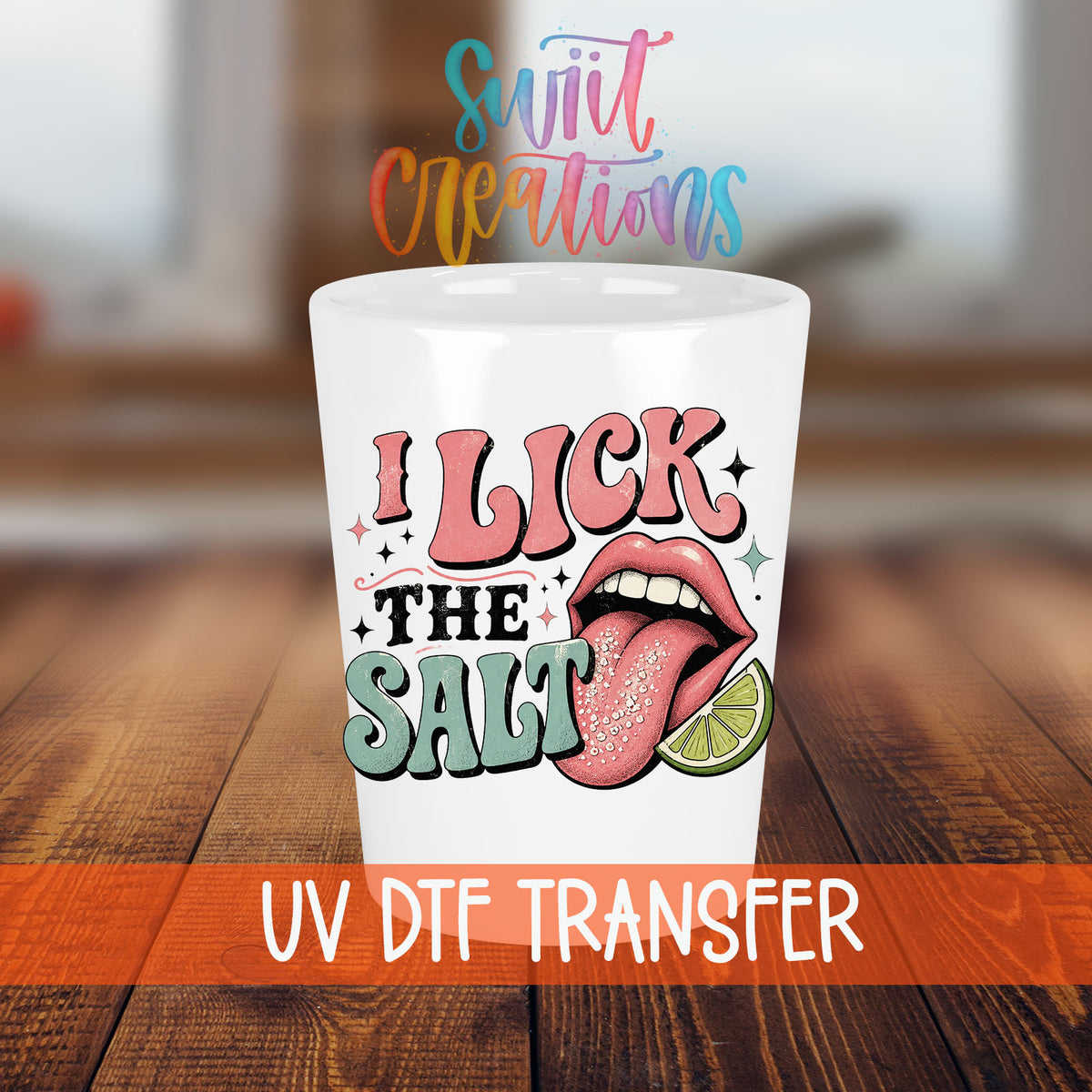 I Lick The Salt shot glass transfer on a white shot glass on a wooden table