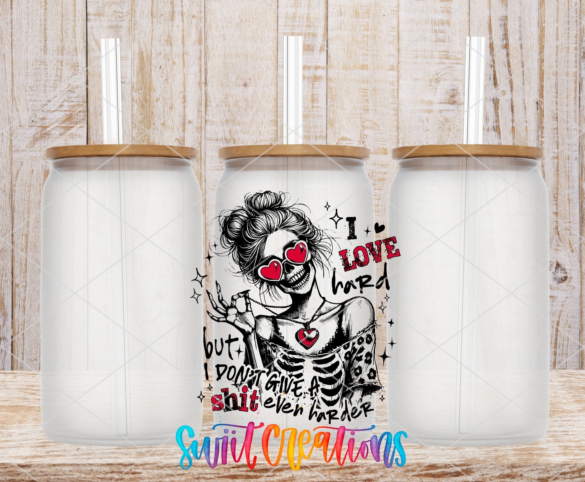 I Love Hard UV DTF transfer applied to a clear glass can set from Swiit Creations