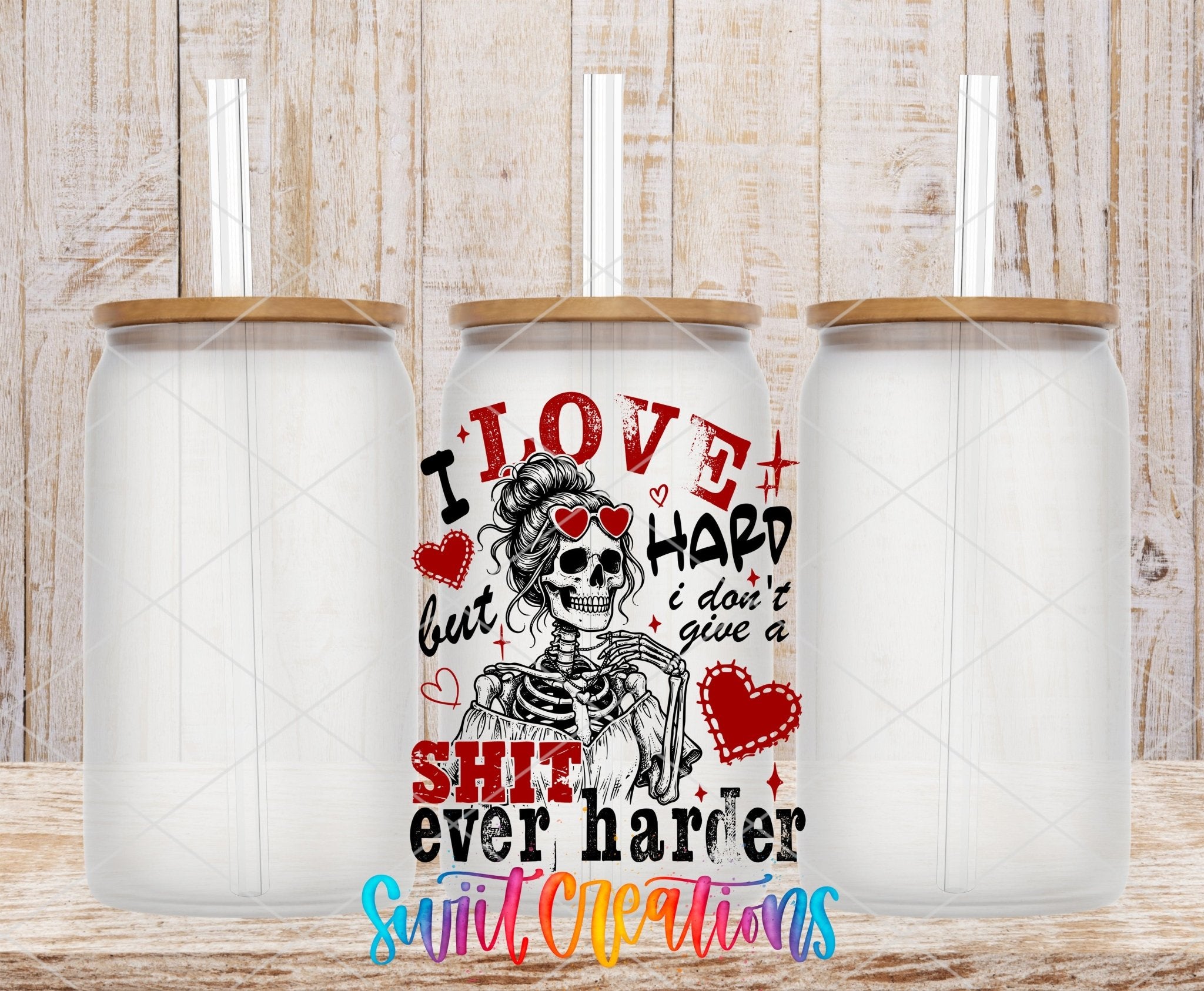 I Love Hard UV DTF transfer applied to a clear glass can set from Swiit Creations