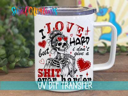 I Love Hard skeleton with hearts UV DTF transfer on a white stainless steel mug with a lid