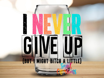 Close-up of the I Never Give Up But I Might B*tch a Little UV DTF transfer on a clear glass can