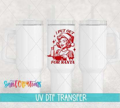 I Put Out for Santa UV DTF transfer on white 40 oz tumblers