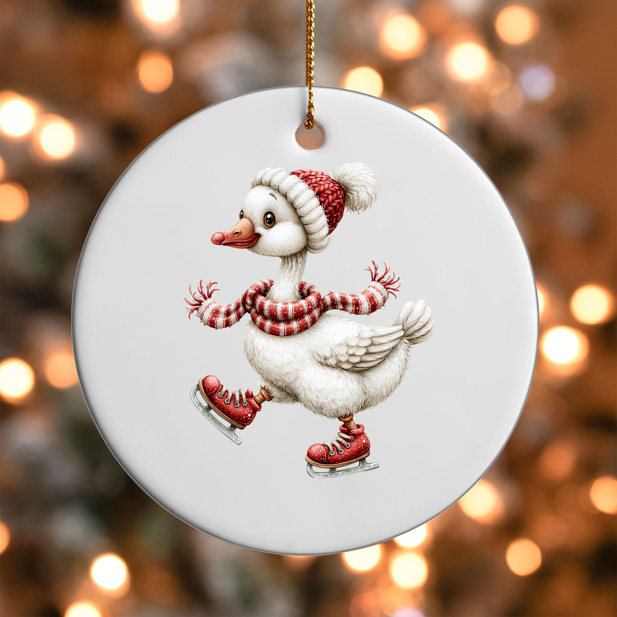 Ice Skating Goose ornament UV DTF transfer on a round white ornament with a bokeh light background