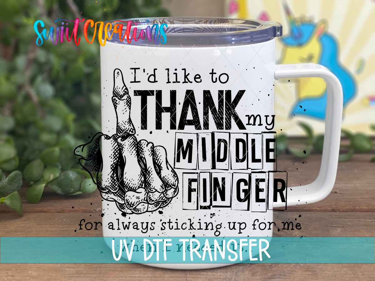 Thank My Middle Finger UV DTF transfer on a white stainless steel mug with a lid