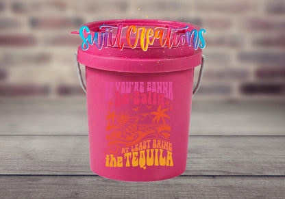 If You're Gonna Be Salty Bring the Tequila UV DTF transfer on a pink mini bucket by a brick wall