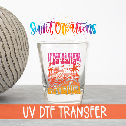 If You're Gonna Be Salty UV DTF transfer on a clear shot glass with the Swiit Creations logo and UV DTF Transfer banner