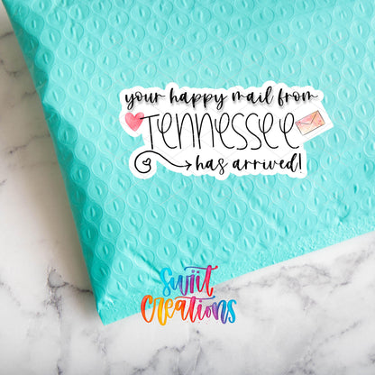 Close-up of happy mail from Tennessee sticker on a teal mailer