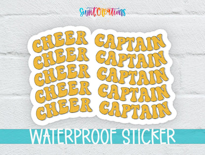 Gold Retro Cheer Captain sticker on a white brick background with a waterproof sticker banner