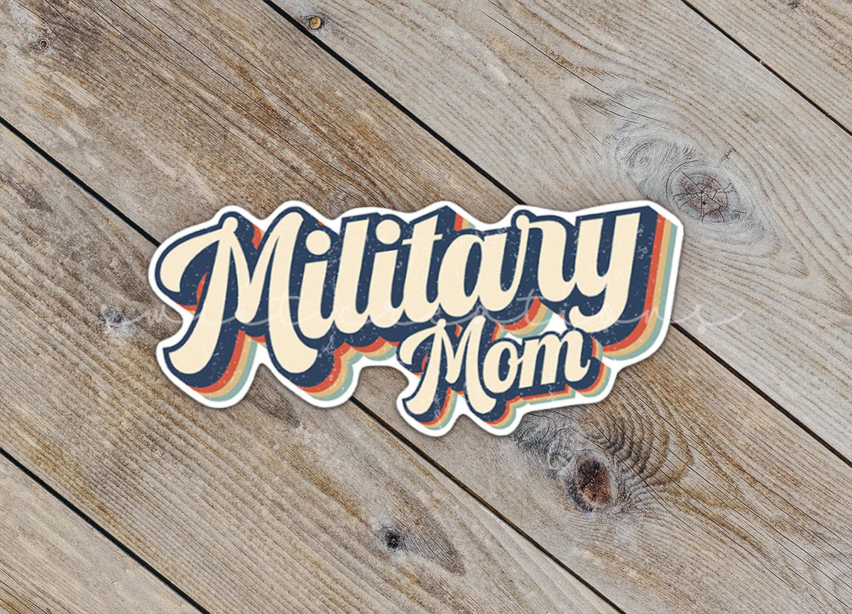 Close-up of the Retro Military Mom sticker on rustic wood