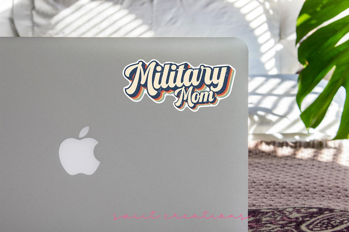 Retro Military Mom sticker on the lid of a silver laptop