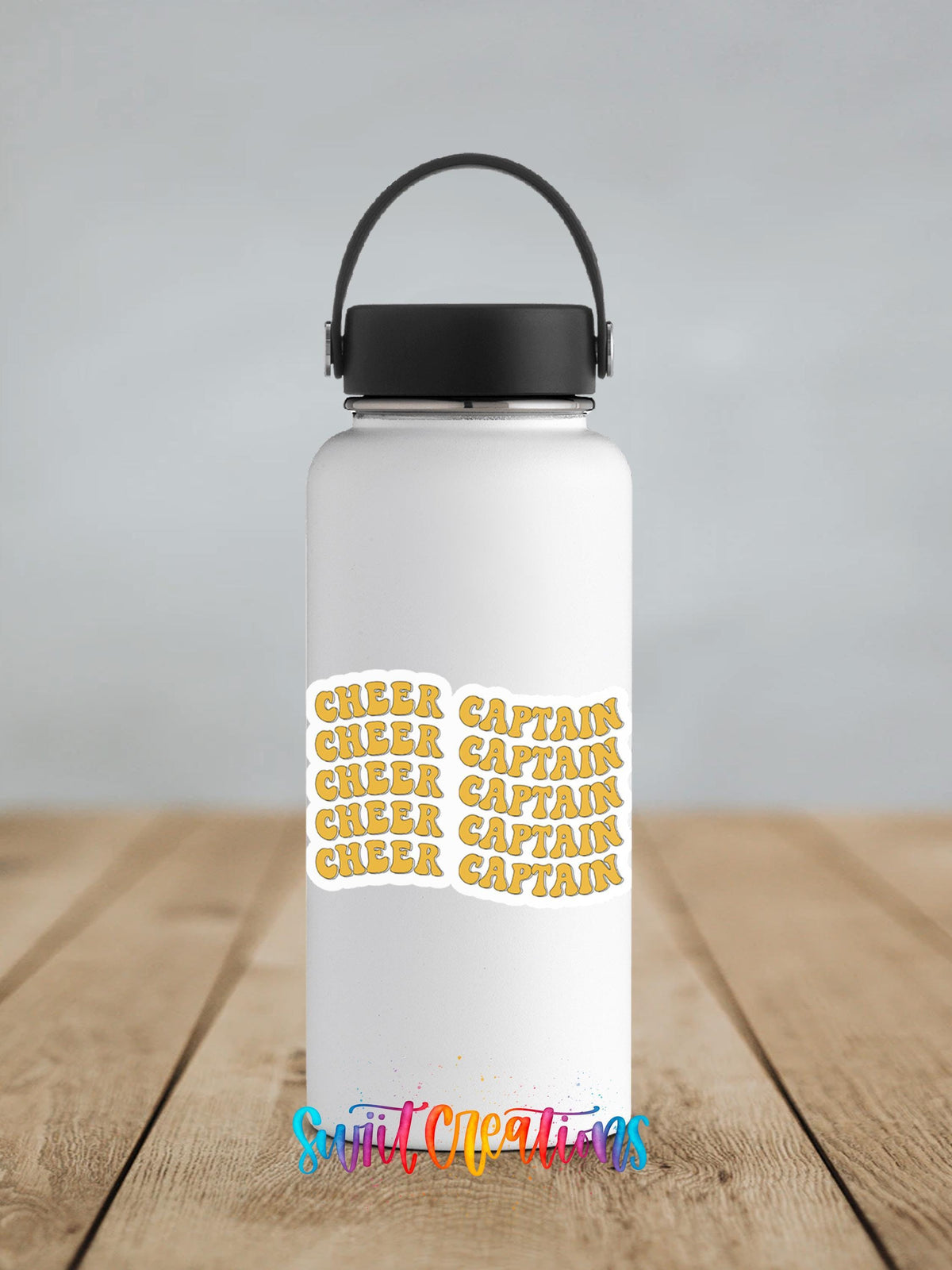 Gold Retro Cheer Captain sticker on a white insulated water bottle