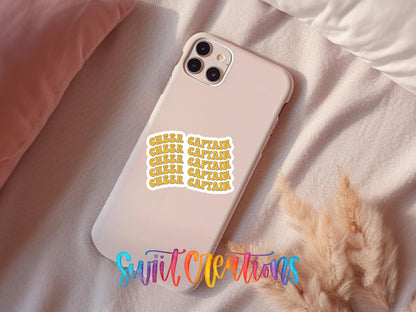 Gold Retro Cheer Captain sticker on a pink phone case