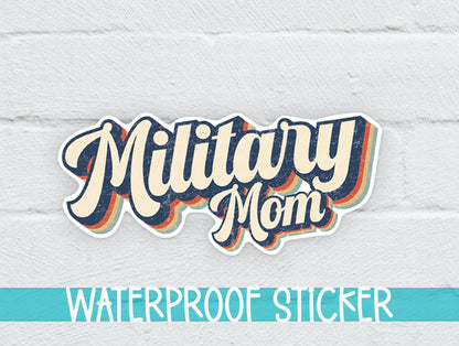 Retro Military Mom sticker on a white brick background with a waterproof sticker banner
