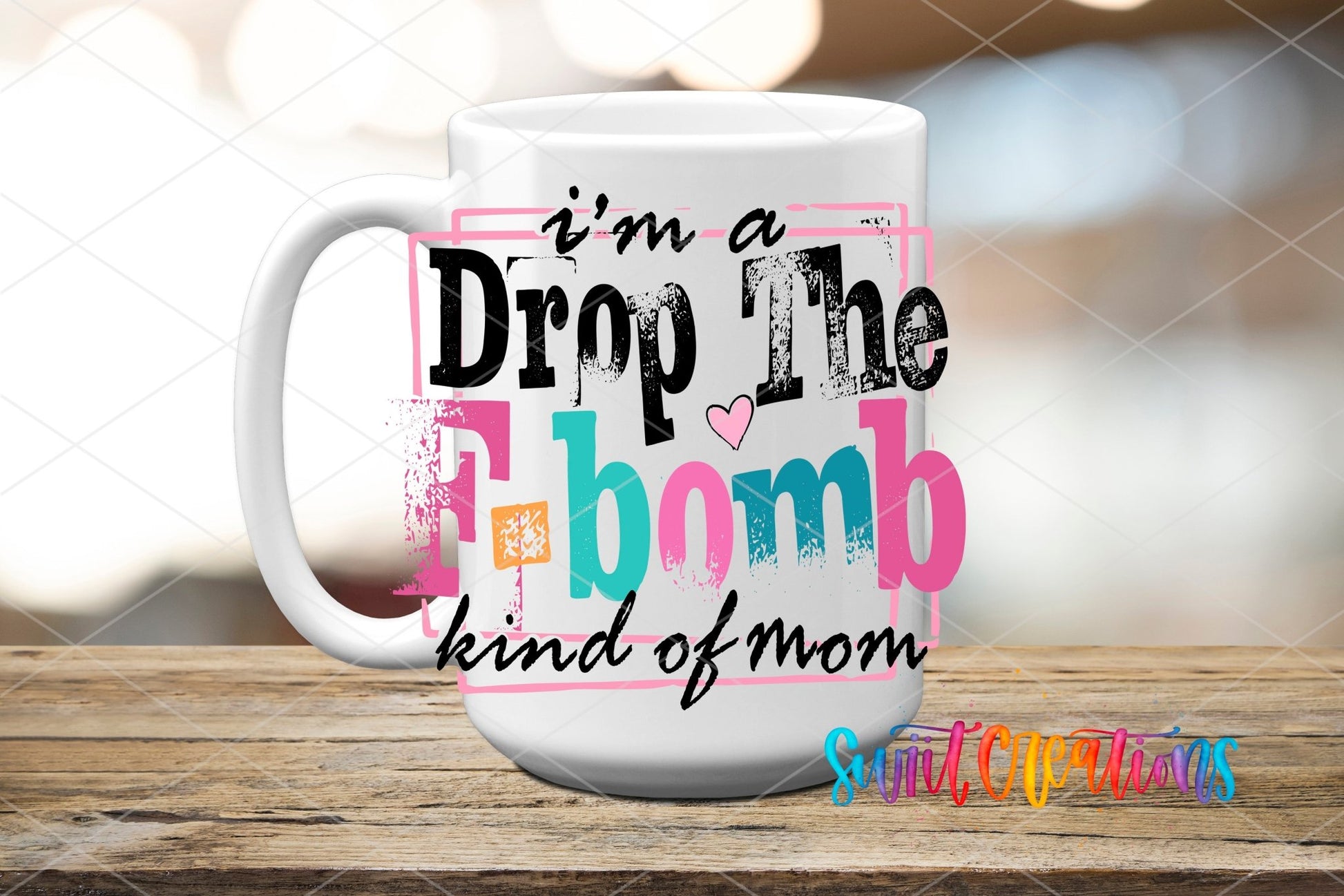 I’m A F Bomb Kind Of Mom UV DTF transfer displayed on a white ceramic mug from Swiit Creations