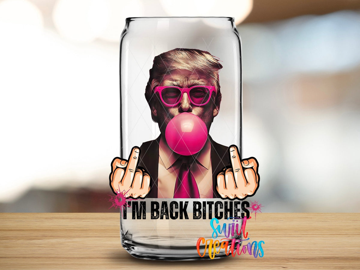 Close-up of the I'm Back B*tches UV DTF transfer on a clear glass can