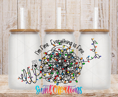 I'm Fine Everything Is Fine UV DTF wrap on three clear glass cans with bamboo lids