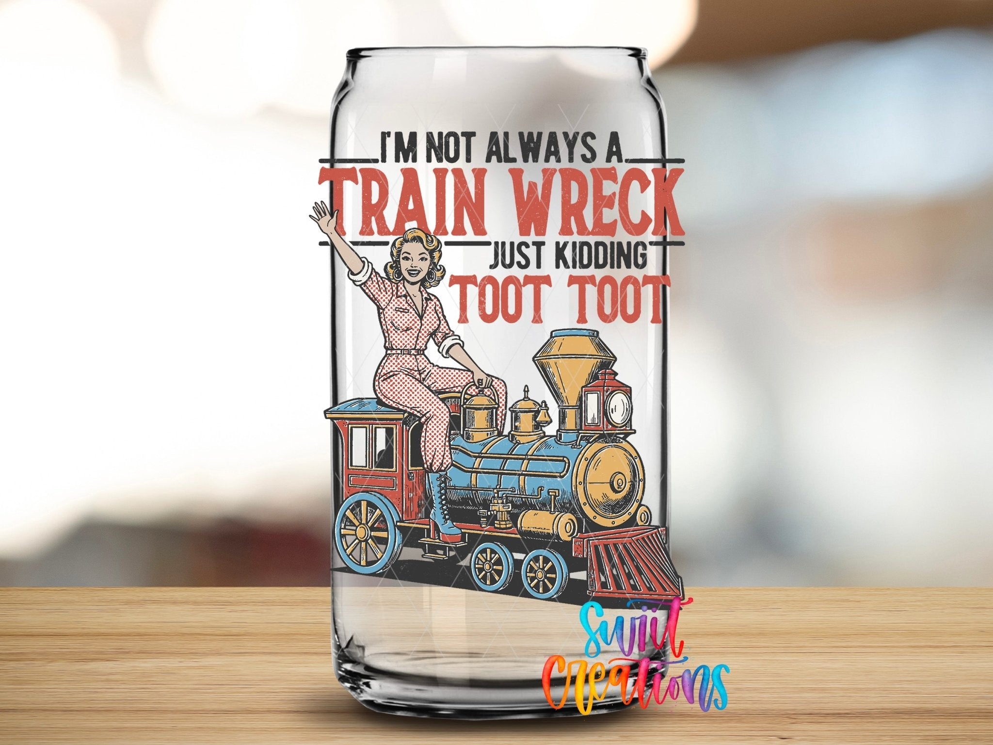 I’m Not Always A Train Wreck UV DTF transfer applied to a clear glass can from Swiit Creations
