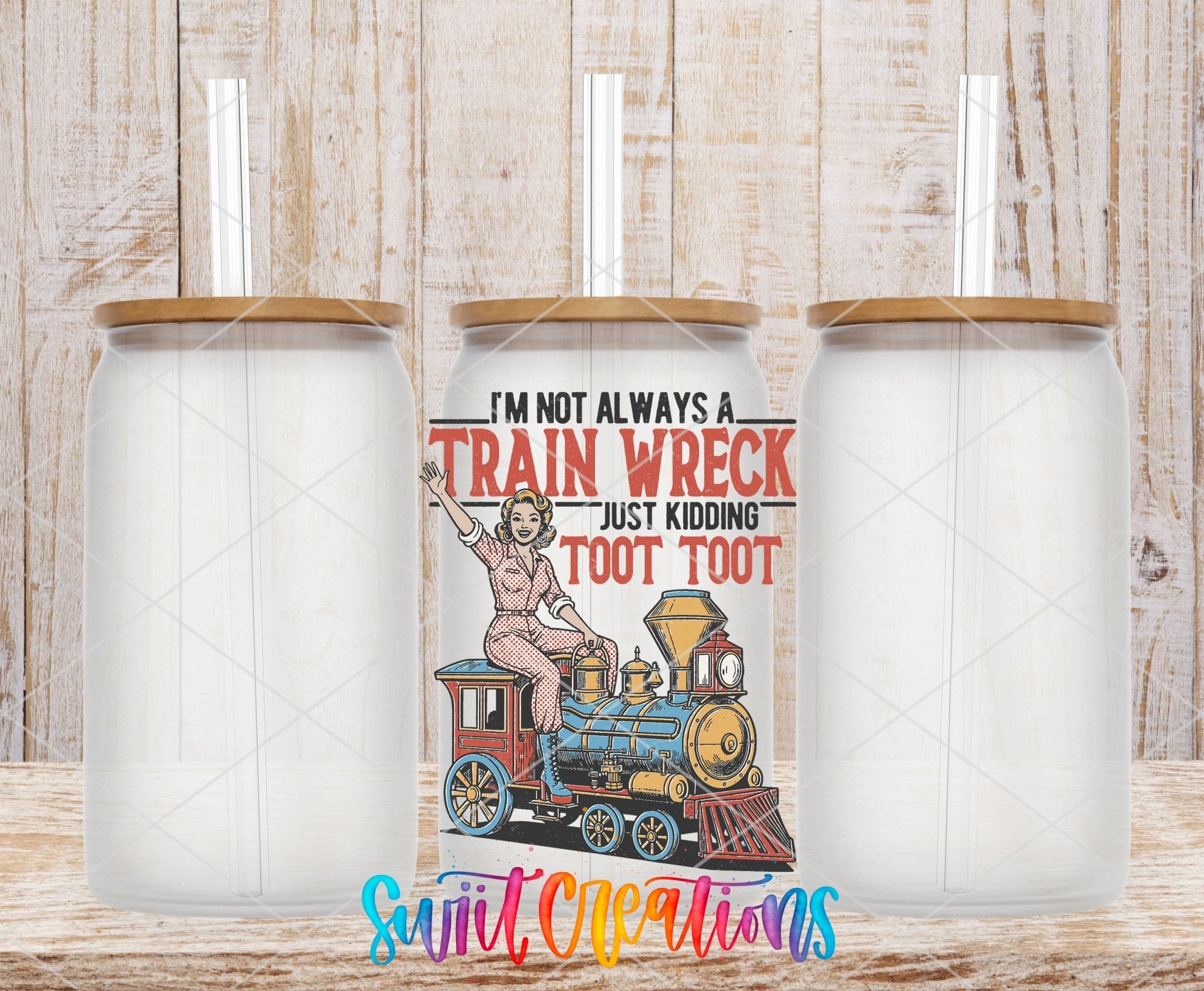 I’m Not Always A Train Wreck UV DTF transfer applied to a clear glass can set from Swiit Creations