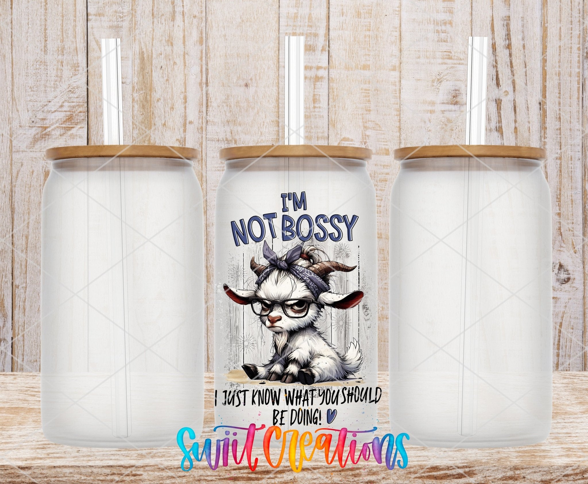 Swiit Creations UV DTF I’m Not Bossy transfer shown on a clear glass can set