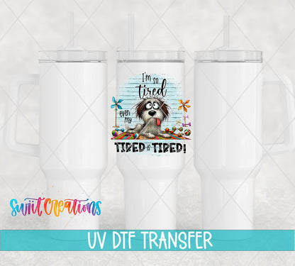 I'm So Tired Even My Tired Is Tired UV DTF transfer on white 40 oz tumblers