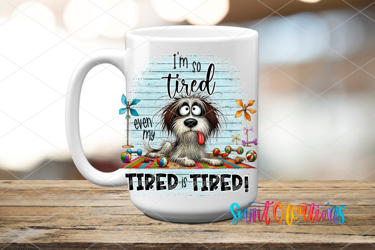 Swiit Creations UV DTF Even My Tired Is Tired transfer applied to a white ceramic mug