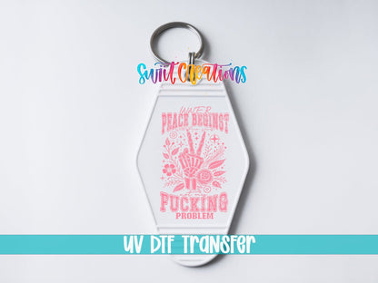 Inner Peace Begins With Four Words UV DTF transfer on a white motel keychain on a white background