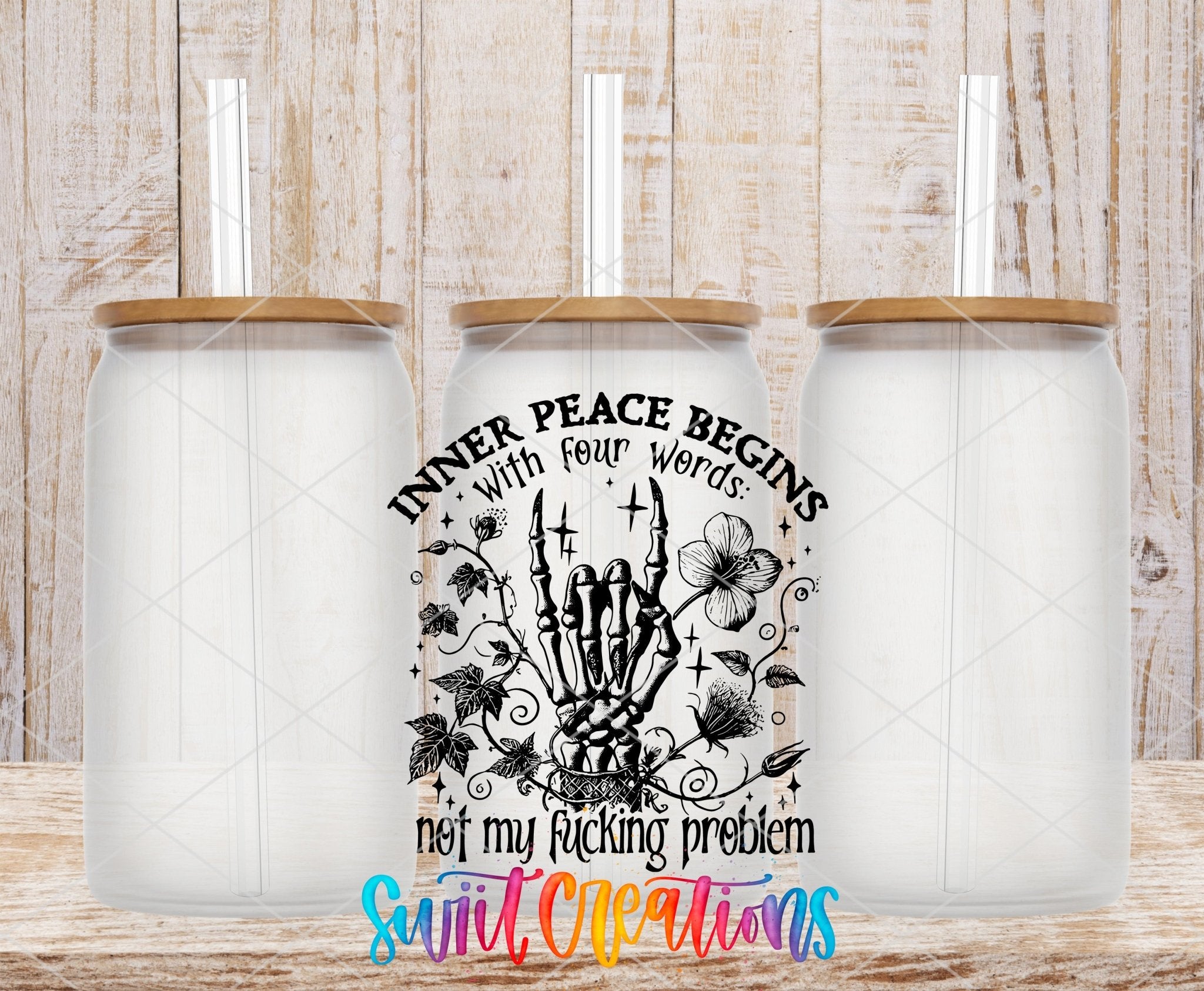 Inner Peace Begins With Four Words UV DTF transfer applied to a clear glass can set from Swiit Creations