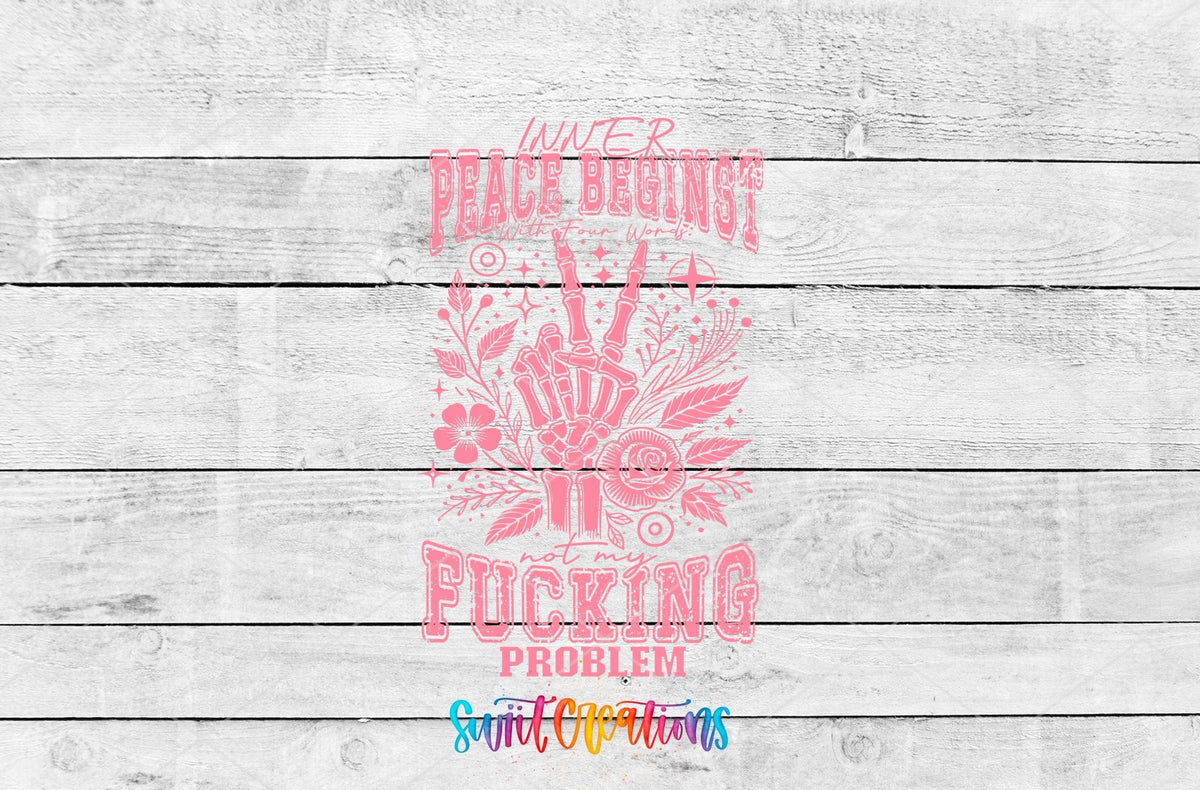 Inner Peace Begins With Four Words pink skeleton hand UV DTF transfer artwork on a white wood background