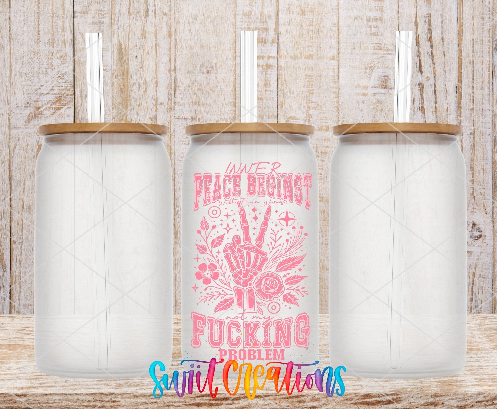 Inner Peace Begins With Four Words UV DTF transfer applied to a clear glass can set from Swiit Creations