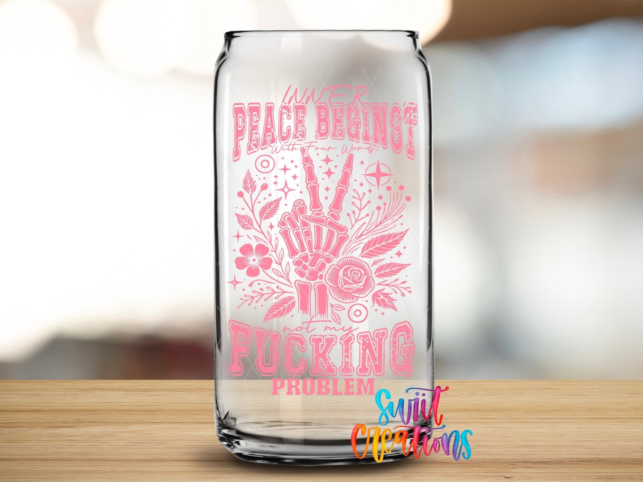 Inner Peace Begins With Four Words UV DTF transfer applied to a clear glass can from Swiit Creations