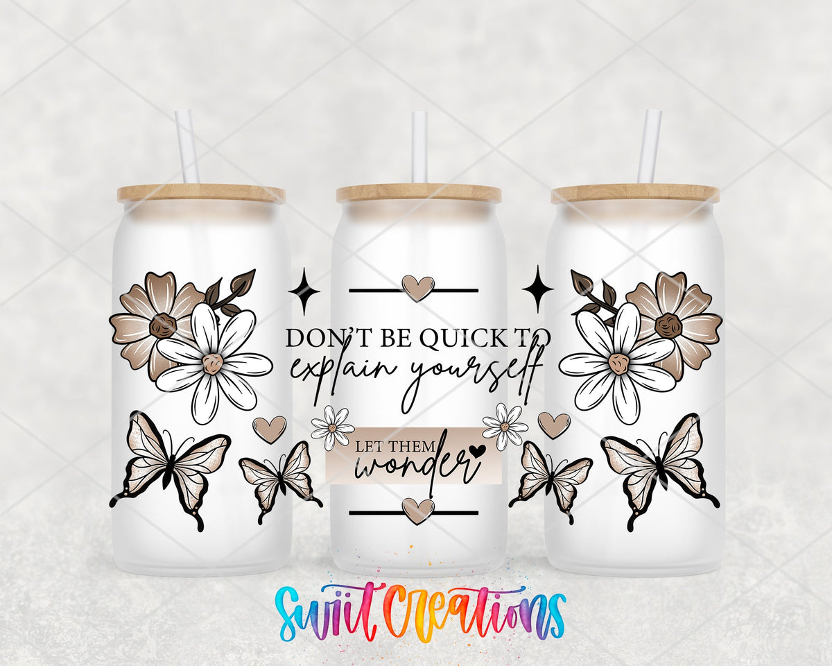 Let Them Wonder UV DTF full wrap on three frosted glass cans