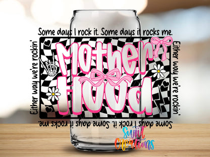 Close-up of the Motherhood UV DTF transfer on a clear glass can